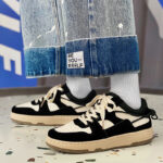 Fashionable low sports footwear trend of season