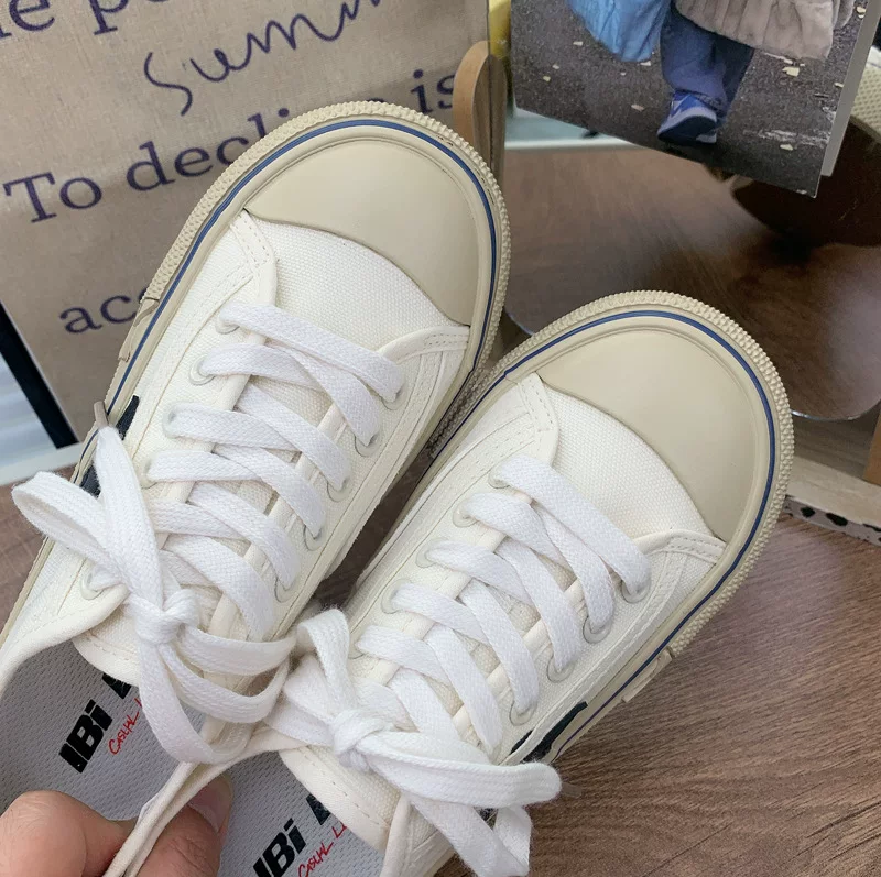 Retro White Shoes for Women New Flats-Soled Lace-Up Star Canvas Shoes for Women Simple and Versatile British Style Casual Shoes 9 O1CN01MdBzLV1R9eK8UXpJt 1607452069 0 cib