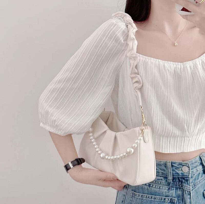 O1CN01Fvlyj01nhT6iVwtIB_2207770725121-0-cib.jpg French Versatile White Pleated Cloud Bag for Women New Pearl Chain Armpit Bag Single Shoulder Crossbody Bag for Women - Image 1
