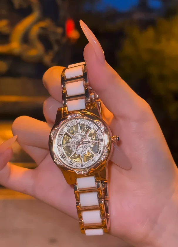 A generation of shaking audio and video number explosions sunflower hollow ladies watch ceramic white flywheel diamond watch women 2 undefined