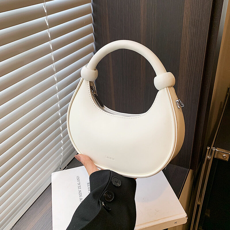 O1CN01a5Yvmw2HKyJrYDapI_2215913929133-0-cib.jpg French Niche Elegant Handheld Small Bag Women's Bag New Trendy Fashion Shoulder Bag Foreign Style Crossbody Dumpling Bag - Image 1